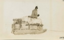 Image of Harold Whitehouse with loaded sledge leaving ship for Cape Dorset
